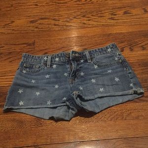 Star patterned blue jean shorts